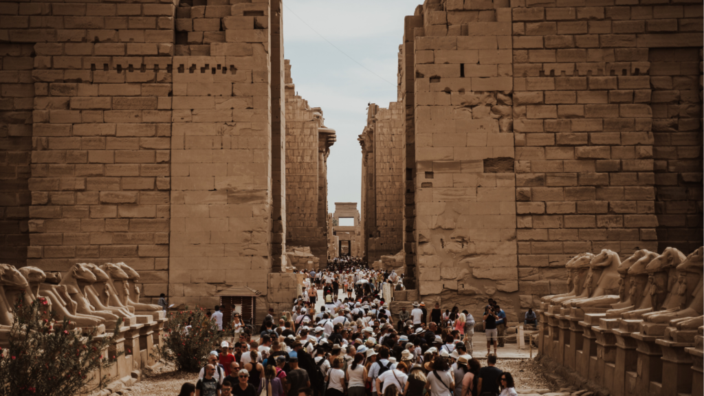 Visitors exploring Karnak Temple in Luxor, Egypt